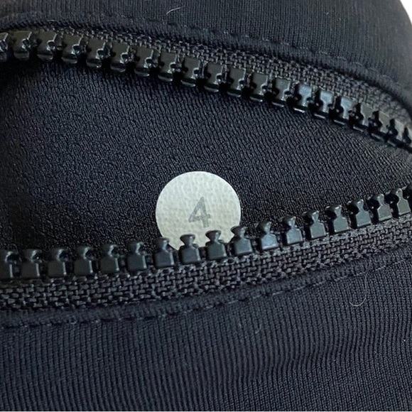 LULULEMON Black Cropped Leggings w/Side Pockets and Mesh Strip on Hem Size 4 - Picture 8 of 8